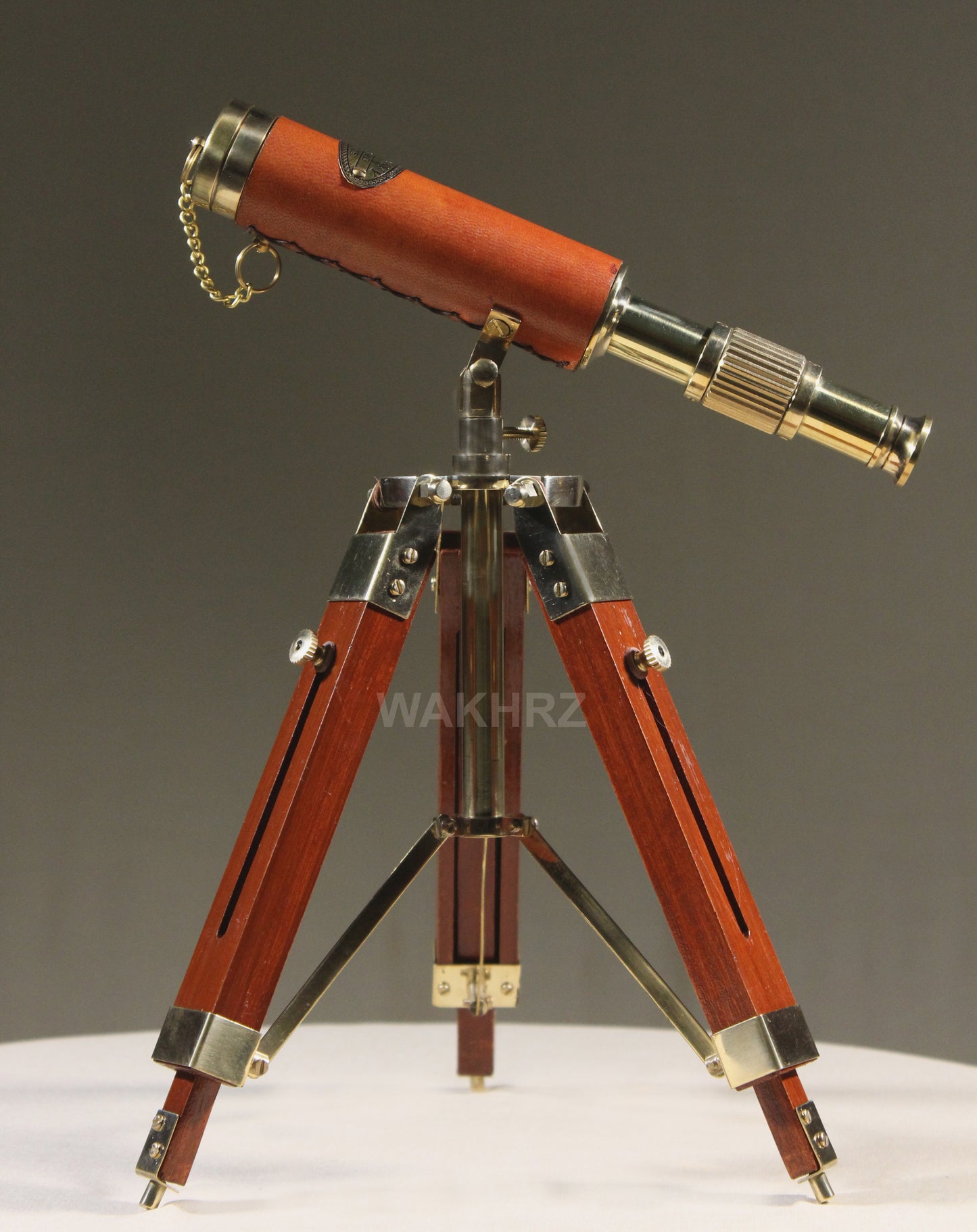 WAKHRZ Brass & Leather Marine Tripod Desk Telescope.
