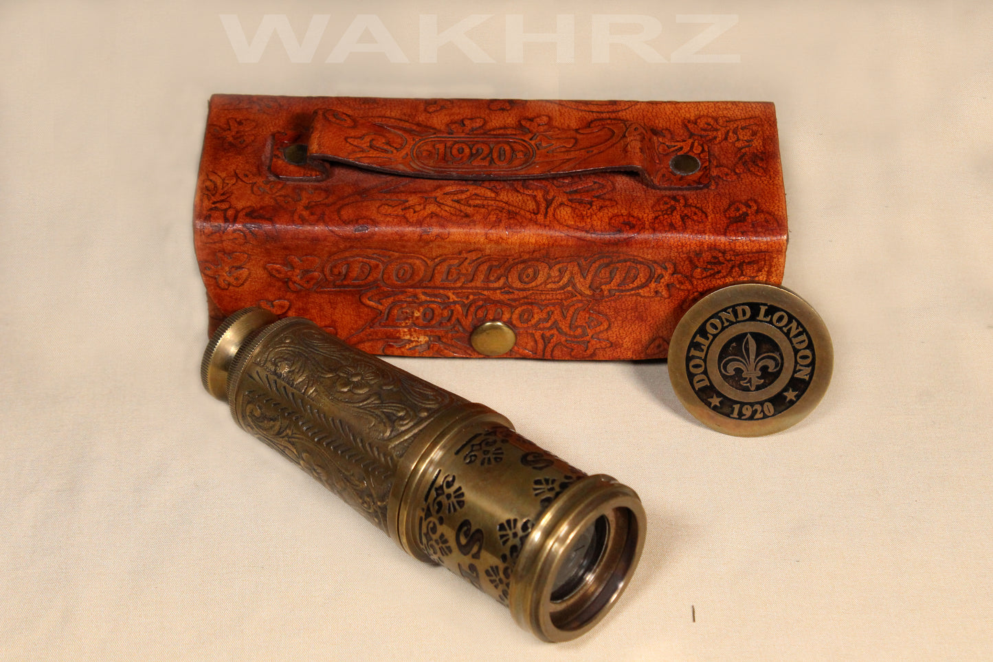 WAKHRZ BRASS MARINE TELESCOPE WITH LEATHER BOX.