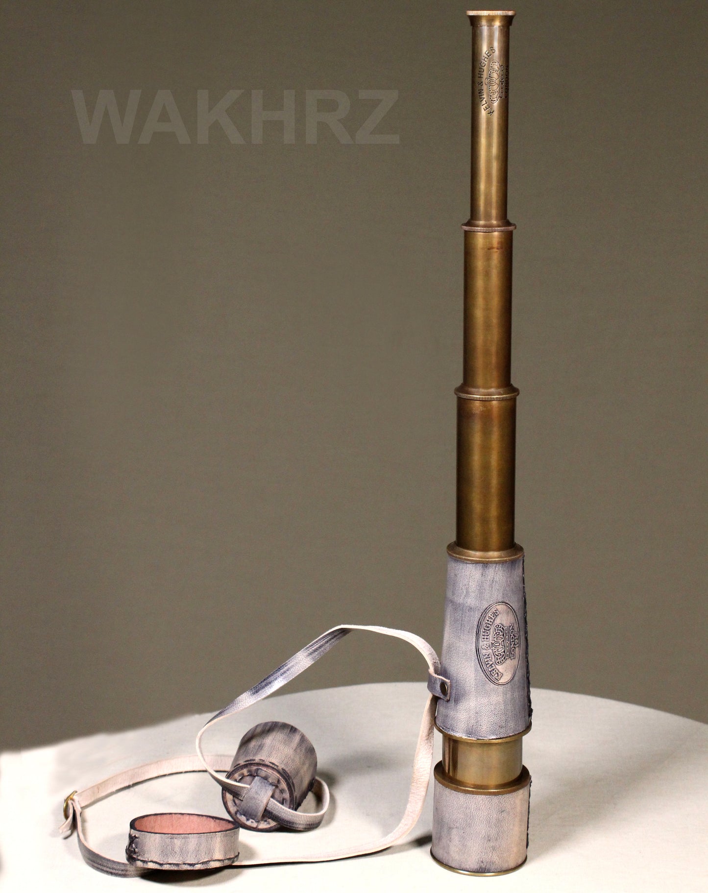 WAKHRZ LONDON 1917 KELVIN & HUGHES TELESCOPE WITH LEATHER FITTED BOX.