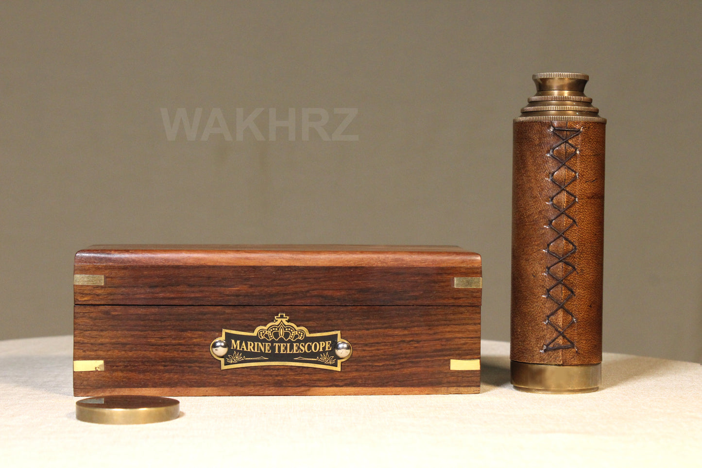 WAKHRZ LEATHER MARINE TELESCOPE WITH WOODEN BOX.