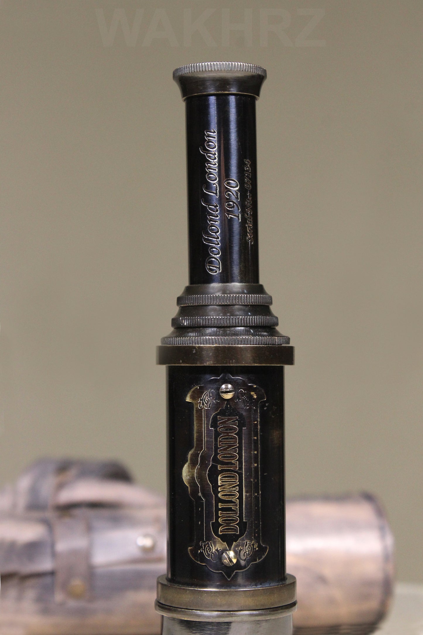 WAKHRZ SHINY BLACK BRASS DOLLOND LONDON TELESCOPE WITH SIDE LEATHER BOX.