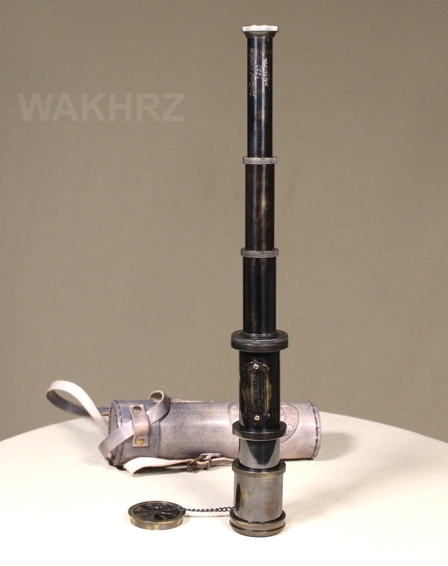 WAKHRZ SHINY BLACK BRASS DOLLOND LONDON TELESCOPE WITH SIDE LEATHER BOX.