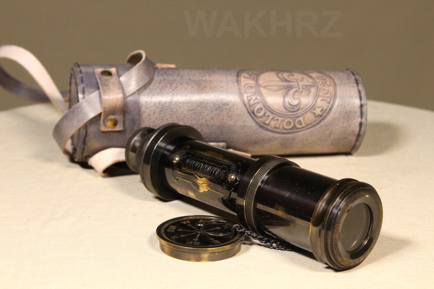 WAKHRZ SHINY BLACK BRASS DOLLOND LONDON TELESCOPE WITH SIDE LEATHER BOX.