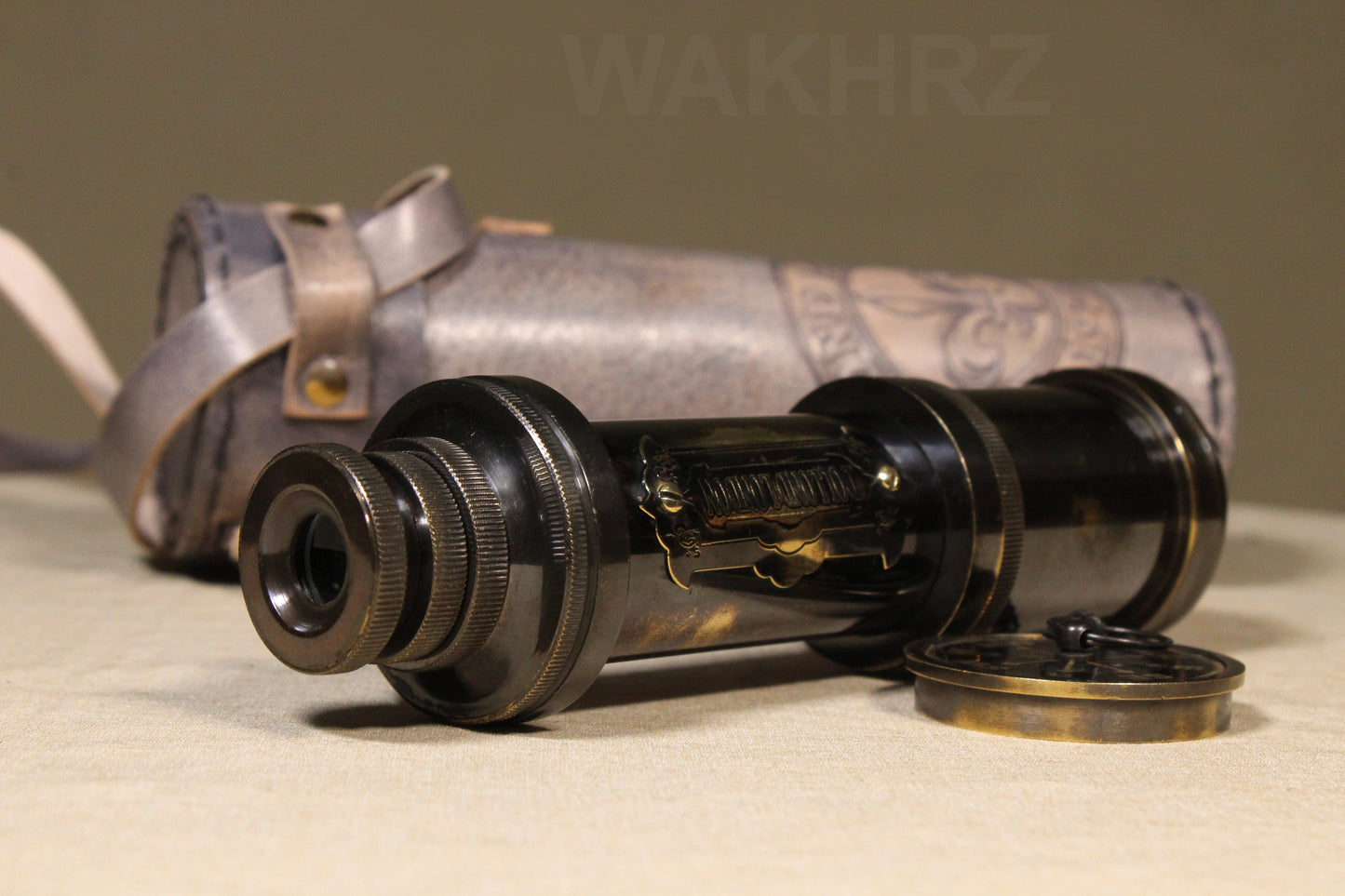 WAKHRZ SHINY BLACK BRASS DOLLOND LONDON TELESCOPE WITH SIDE LEATHER BOX.