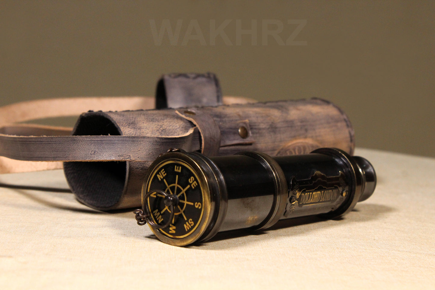 WAKHRZ SHINY BLACK BRASS DOLLOND LONDON TELESCOPE WITH SIDE LEATHER BOX.