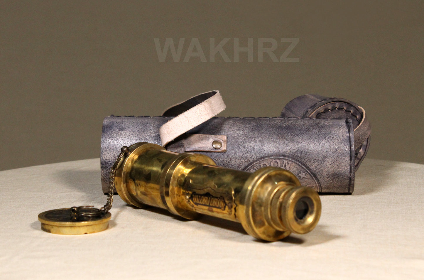 WAKHRZ SHINY BRASS DOLLOND LONDON TELESCOPE WITH SIDE LEATHER BOX.