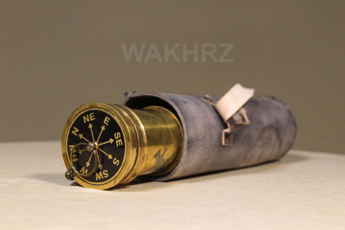 WAKHRZ SHINY BRASS DOLLOND LONDON TELESCOPE WITH SIDE LEATHER BOX.
