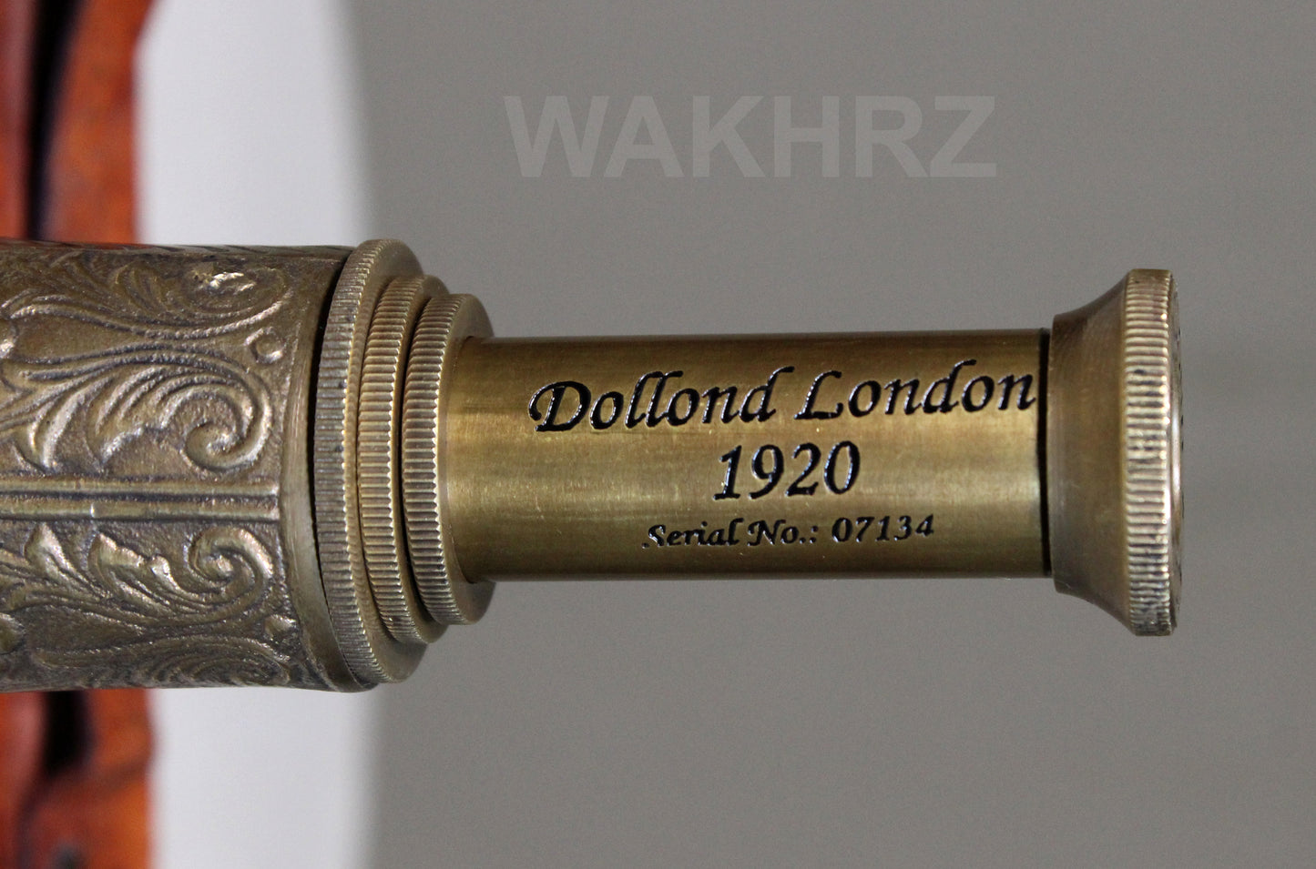 WAKHRZ BRASS MARINE TELESCOPE WITH LEATHER BOX.