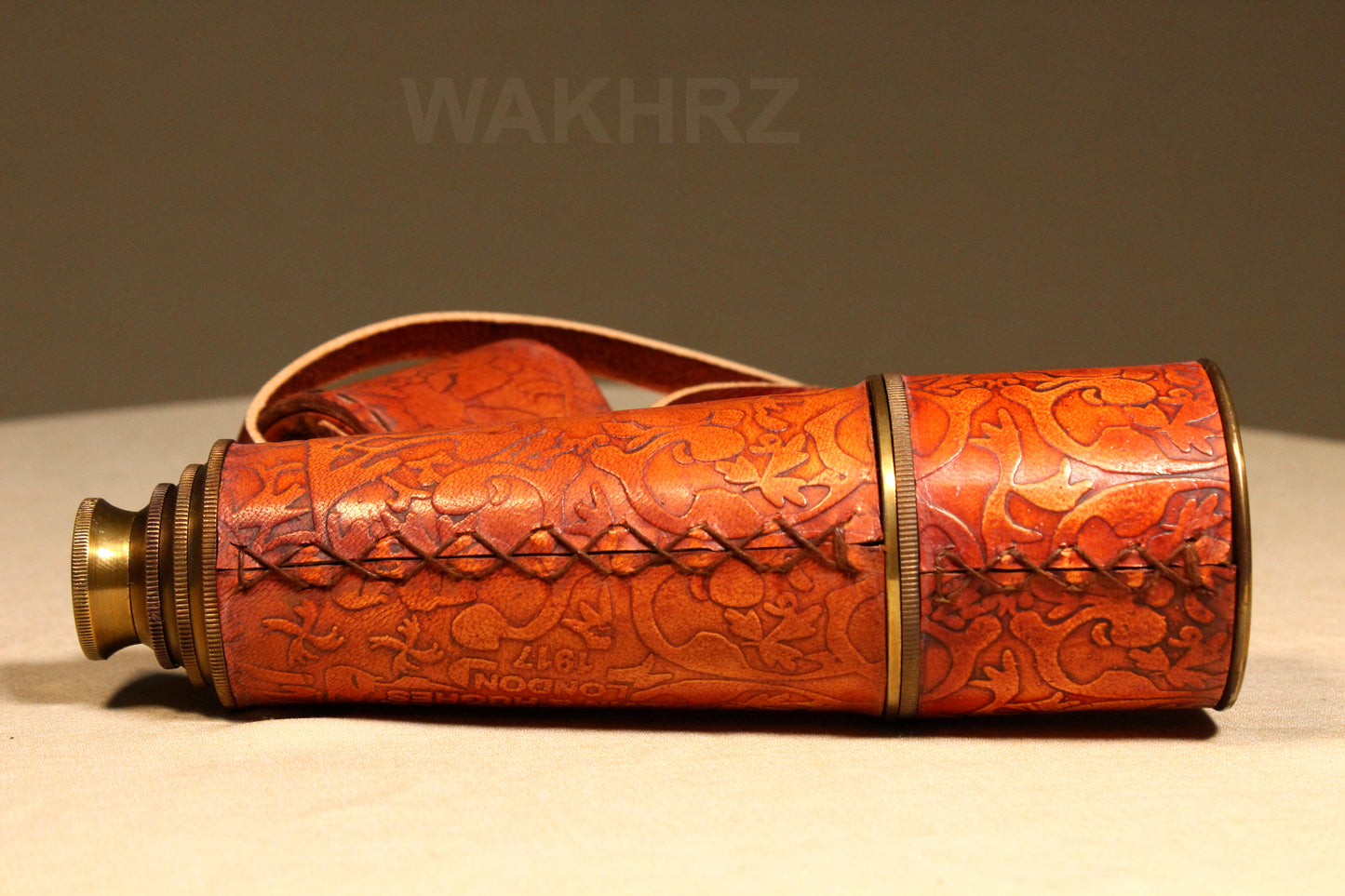WAKHRZ LONDON 1917 KELVIN & HUGHES LIGHT RED TELESCOPE WITH LEATHER FITTED BOX.