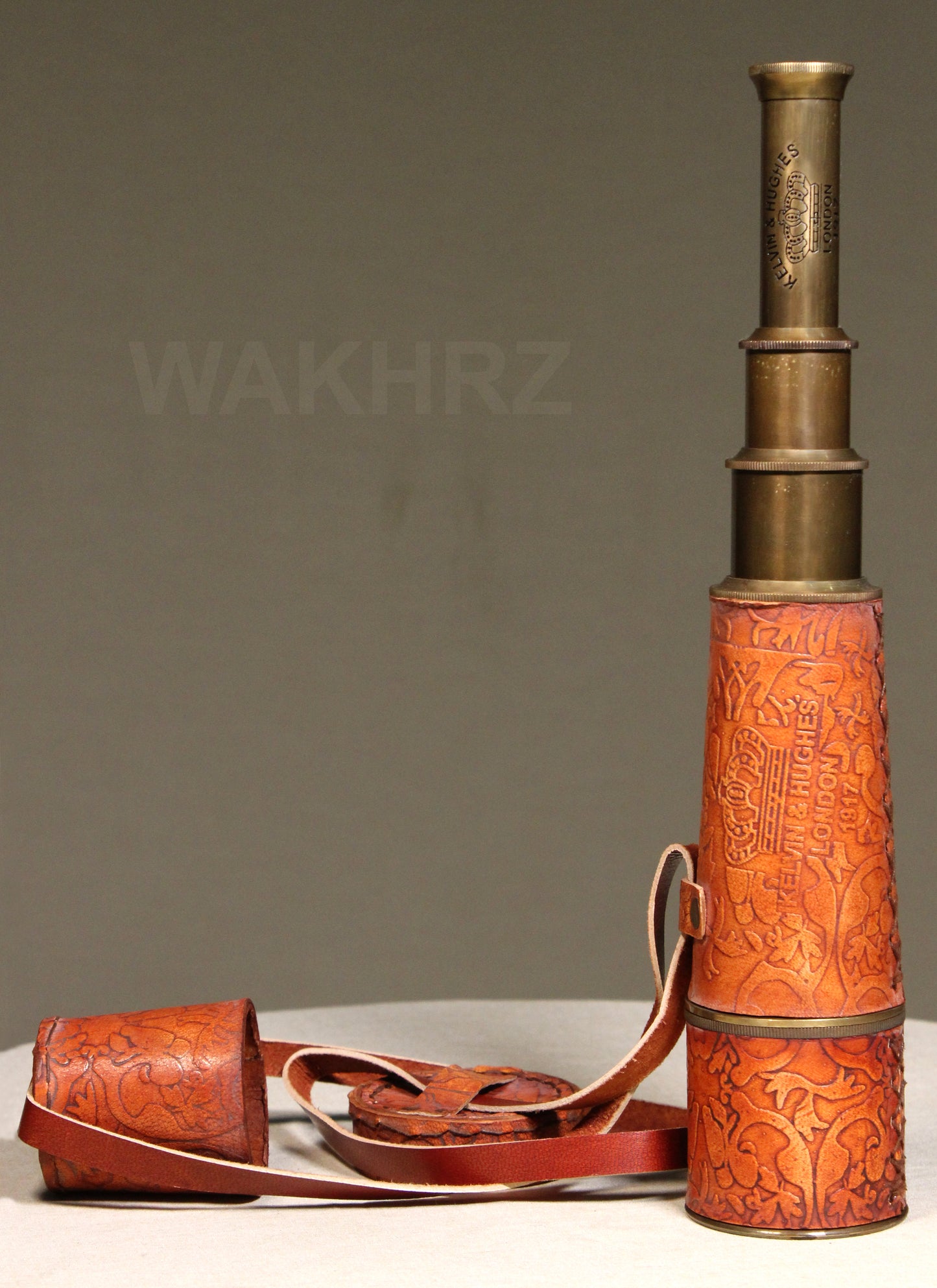 WAKHRZ LONDON 1917 KELVIN & HUGHES LIGHT RED TELESCOPE WITH LEATHER FITTED BOX.