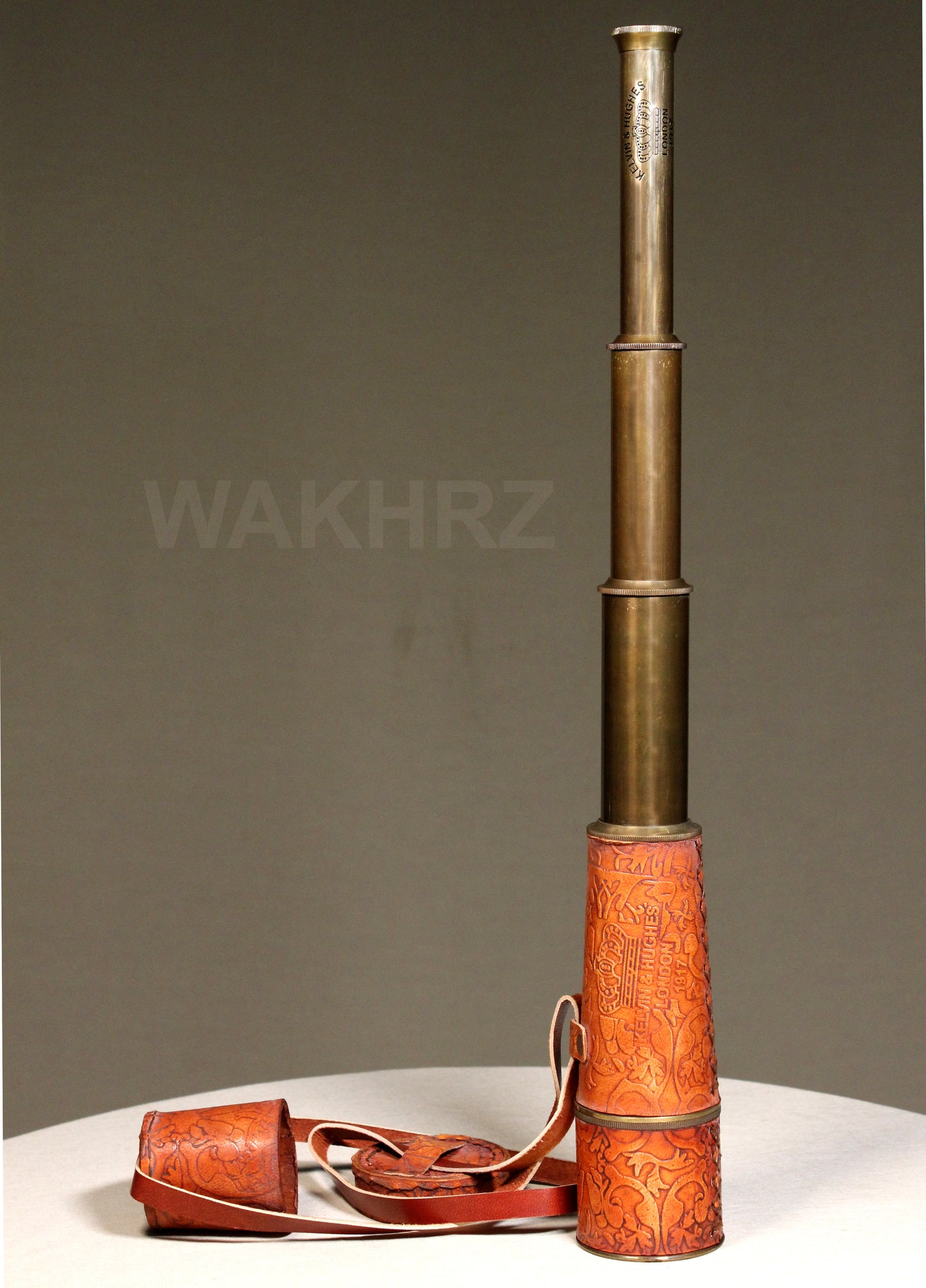 WAKHRZ LONDON 1917 KELVIN & HUGHES LIGHT RED TELESCOPE WITH LEATHER FITTED BOX.